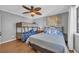 Bedroom with a full bed, bunk beds, and coastal decor including a ceiling fan at 4350 Intercoastal Dr. # 2301, Little River, SC 29566