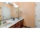 Bathroom features a double sink vanity with dark wood cabinets at 5040 Hampton Rd., Conway, SC 29527