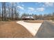 Secluded home with a long, curving driveway, surrounded by mature trees and expansive lawn at 5040 Hampton Rd., Conway, SC 29527