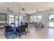 Community living space with tile floors and comfortable seating near the pool at 6007 Forest Dell Ct, Myrtle Beach, SC 29579