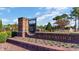 Waterbridge community entrance with brick signage and manicured landscaping on a sunny day at 6055 Forest Dell Ct, Myrtle Beach, SC 29579