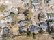 Aerial view of the residential neighborhood with tree-lined streets, sidewalks, and variety of home styles at 617 Rosemary Ln., North Myrtle Beach, SC 29582