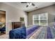 Well-lit bedroom with ample natural light from the window and includes a spacious closet at 6253 Catalina Dr. # 1711, North Myrtle Beach, SC 29582