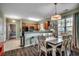 Dining room with hardwood floors, view of living room and kitchen at 6253 Catalina Dr. # 1711, North Myrtle Beach, SC 29582