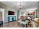 Cozy living room featuring hardwood floors, furniture, and a view into the kitchen at 6253 Catalina Dr. # 1711, North Myrtle Beach, SC 29582