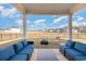 Inviting covered patio with comfortable seating, perfect for outdoor relaxation and entertaining with views at 723 Joywood Dr., Longs, SC 29568
