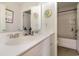 Bright bathroom with double sinks, a large mirror, modern fixtures, and a shower-tub combination at 723 Joywood Dr., Longs, SC 29568