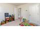 Carpeted bedroom with a storage and play area, perfect for or guests at 723 Joywood Dr., Longs, SC 29568