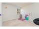 Bright bedroom with a window, carpet flooring, and ample space for play and creative expression at 723 Joywood Dr., Longs, SC 29568