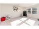 Bright bedroom with carpeted floors, natural light, and neutral-colored walls, offering a cozy and inviting space at 723 Joywood Dr., Longs, SC 29568