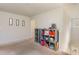 Versatile bonus room with carpet, perfect for a playroom or additional living space at 723 Joywood Dr., Longs, SC 29568