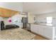 Kitchen with white cabinets, granite countertops, stainless steel appliances, and hardwood flooring at 723 Joywood Dr., Longs, SC 29568