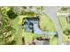An aerial view showcases the home's roof, driveway, and surrounding landscaping at 75 Haig Ct., Georgetown, SC 29440
