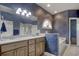 Bathroom with a double sink vanity, stylish fixtures, and a separate tub and shower at 75 Haig Ct., Georgetown, SC 29440