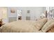 Bright bedroom with neutral walls and trim plus view into adjoining living space at 75 Haig Ct., Georgetown, SC 29440