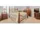 Cozy bedroom featuring a wrought iron bed frame and warm, neutral tones at 75 Haig Ct., Georgetown, SC 29440