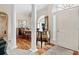 An elegant foyer featuring a view into the dining room, hardwood flooring and a decorative entrance at 75 Haig Ct., Georgetown, SC 29440