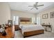 Main bedroom featuring carpeted floor, ceiling fan and decorative furnishings at 75 Haig Ct., Georgetown, SC 29440