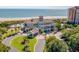 This aerial view showcases a stunning coastal property with pristine beach access and ocean views at 7538 Ventura Ct., Myrtle Beach, SC 29572