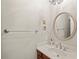 Bathroom with modern vanity, faucet, light fixture, and round mirror at 7538 Ventura Ct., Myrtle Beach, SC 29572