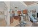Open kitchen boasts stainless appliances, wooden cabinetry, and granite countertops at 7538 Ventura Ct., Myrtle Beach, SC 29572