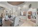 Spacious living area with arched entries, neutral colors, and easy access to the kitchen at 7538 Ventura Ct., Myrtle Beach, SC 29572