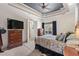 This spacious main bedroom features a beautiful trey ceiling, fan, and natural light at 7538 Ventura Ct., Myrtle Beach, SC 29572