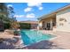 Lovely pool and spa surrounded by lush greenery and outdoor kitchen offering a private oasis at 7538 Ventura Ct., Myrtle Beach, SC 29572