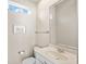 Stylish powder room with modern fixtures, decorative sign, and well-placed lighting at 7538 Ventura Ct., Myrtle Beach, SC 29572