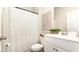 Bright bathroom featuring a shower/tub combo with white vanity and complementary neutral decor at 8072 Bear Claw Way, Conway, SC 29526