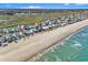 Beachfront homes near Murrells Inlet with ocean and marsh views at 885 S Waccamaw Dr., Garden City Beach, SC 29576