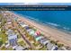 View of the oceanfront home with a deeper lot and protective dunes at 885 S Waccamaw Dr., Garden City Beach, SC 29576