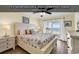 Beautiful Primary bedroom with ocean views, ceiling fan, and coastal decor at 885 S Waccamaw Dr., Garden City Beach, SC 29576