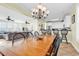 Open floor plan with a dining table and a view of the living room and kitchen at 885 S Waccamaw Dr., Garden City Beach, SC 29576
