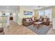Upstairs living room with comfortable seating, neutral decor, and an ocean view at 885 S Waccamaw Dr., Garden City Beach, SC 29576