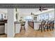 The living room flows into the kitchen and features beautiful ocean views, perfect for entertaining and relaxation at 885 S Waccamaw Dr., Garden City Beach, SC 29576