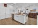 Kitchen island with sink, stainless steel appliances, and an open layout at 892 Harrison Mill St., Myrtle Beach, SC 29579