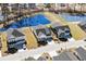 Aerial view of homes and community with pond, trees, and green space at 9035 Binnicker Dr., Murrells Inlet, SC 29576
