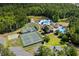 Aerial view of community amenities: swimming pool, playground, tennis courts, basketball court at 9035 Binnicker Dr., Murrells Inlet, SC 29576