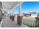 View from the brick-columned front porch of the street and neighboring homes at 9035 Binnicker Dr., Murrells Inlet, SC 29576