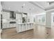 Modern kitchen with a center island, stainless steel appliances, and ample counter space at 9035 Binnicker Dr., Murrells Inlet, SC 29576