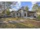 Spacious backyard featuring patio area and lush greenery at 954 Oakwood Ln., Myrtle Beach, SC 29572