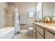 Bathroom with beige countertops, tile flooring and shower walls at 9800 Plumfield Ct., Myrtle Beach, SC 29579