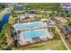 Aerial view of the community pool, with pools, lounge areas, and clubhouse at 9800 Plumfield Ct., Myrtle Beach, SC 29579