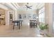 Stylish living room with coffered ceiling, light wood floors, foosball table, and natural light at 9800 Plumfield Ct., Myrtle Beach, SC 29579