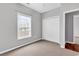 Bedroom with carpeted floors, window, and closet at 1018 Red Sky Ln. # 101, Murrells Inlet, SC 29576