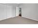 Bedroom with carpeted floors and dual closets at 1018 Red Sky Ln. # 101, Murrells Inlet, SC 29576