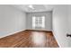 Comfortable bedroom with carpet flooring, a ceiling fan, and a bright window at 1018 Red Sky Ln. # 101, Murrells Inlet, SC 29576