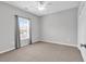 A bedroom with carpeted floors and a window at 1018 Red Sky Ln. # 101, Murrells Inlet, SC 29576