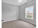 Bedroom with carpeted floors and a window at 1018 Red Sky Ln. # 101, Murrells Inlet, SC 29576